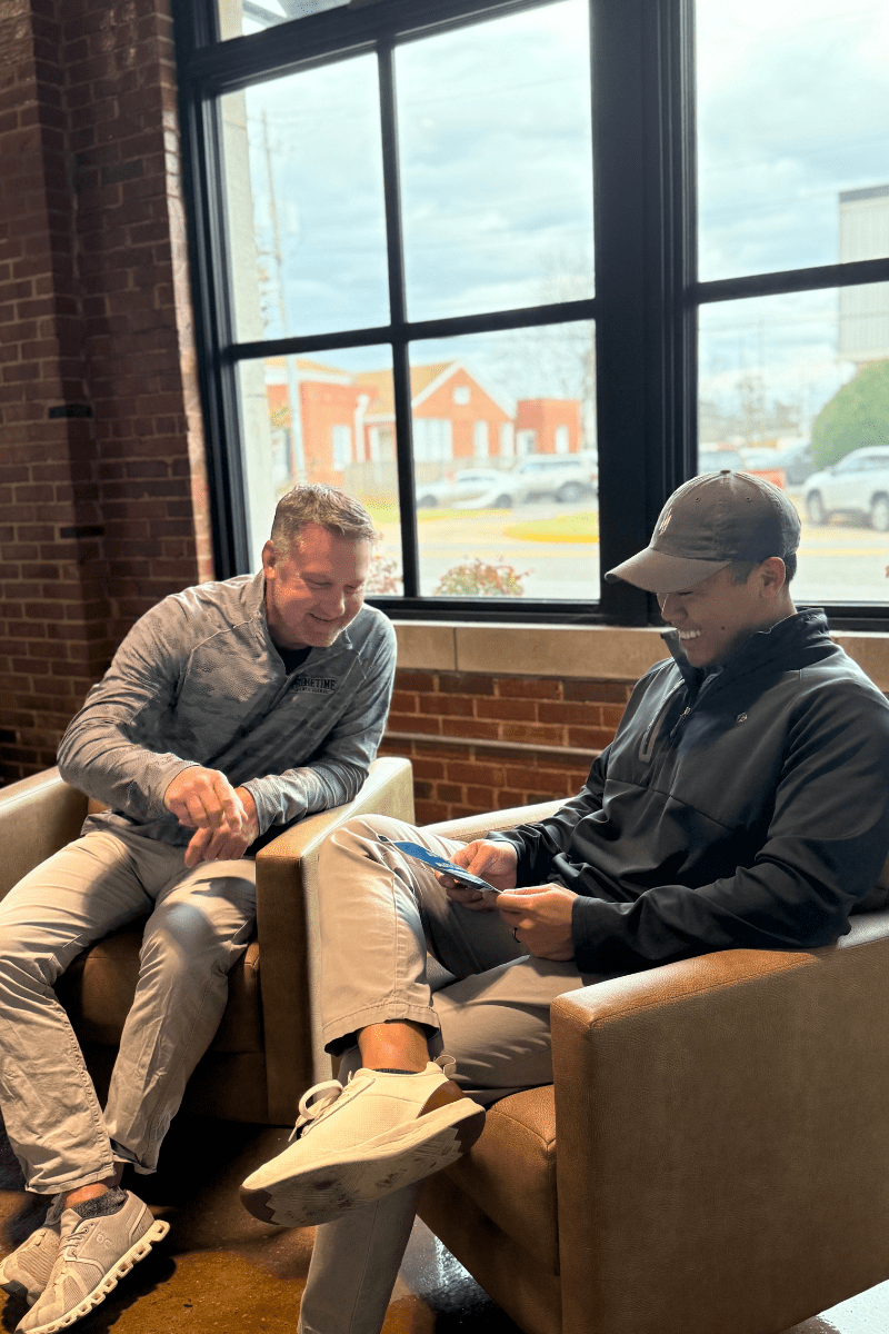 Male patient reviewing testosterone lab results with physician Tuscaloosa AL